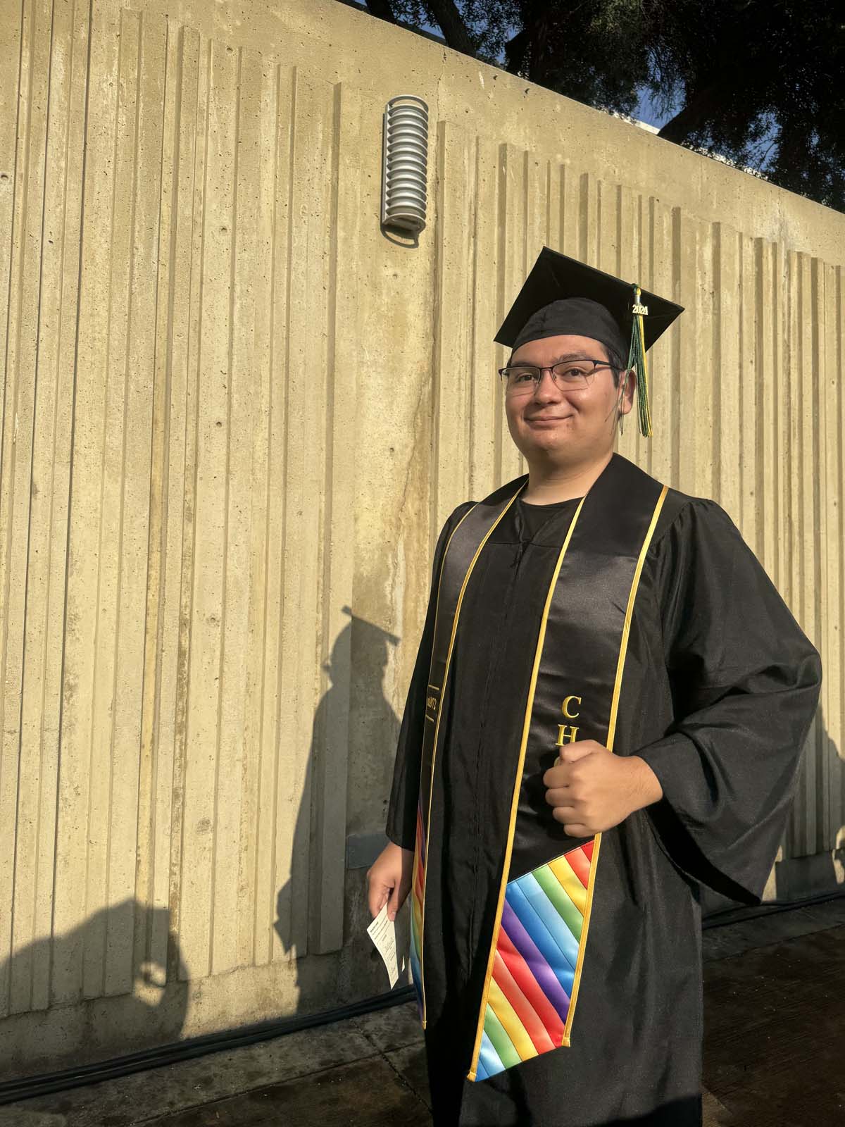Graduates walk to stage at CHC's Commencement 2024.
