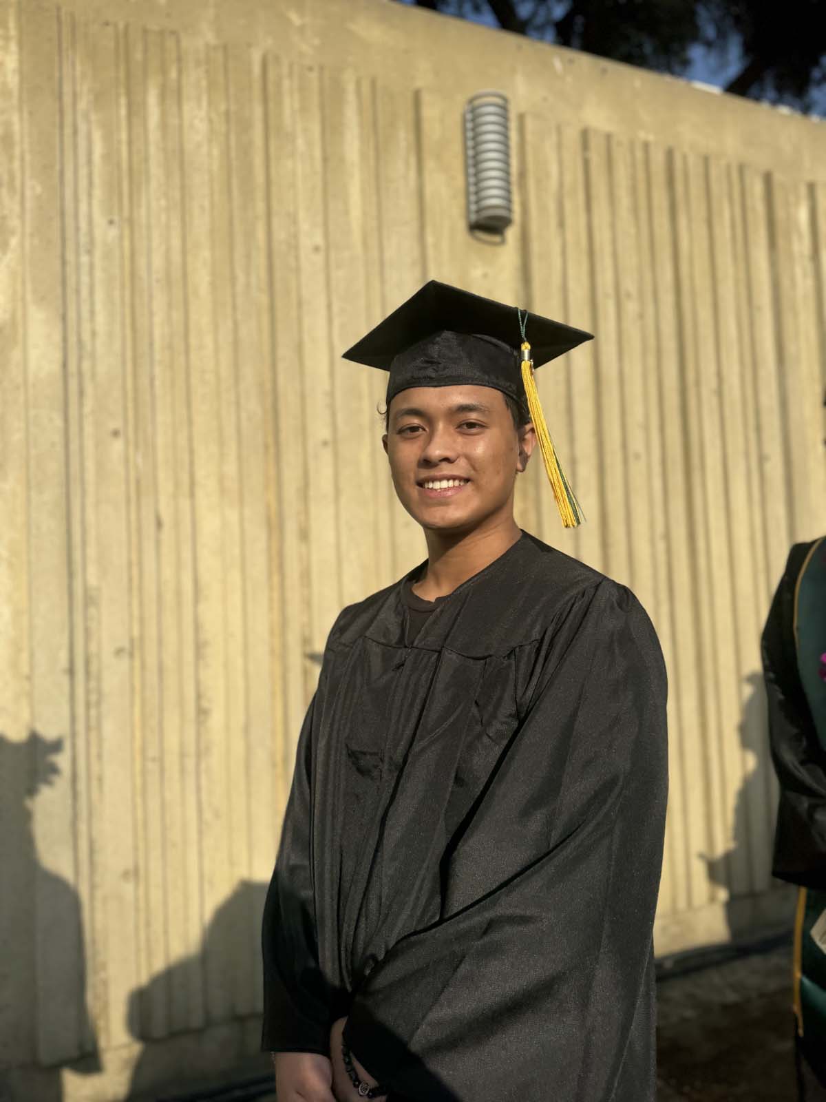 Graduates walk to stage at CHC's Commencement 2024.