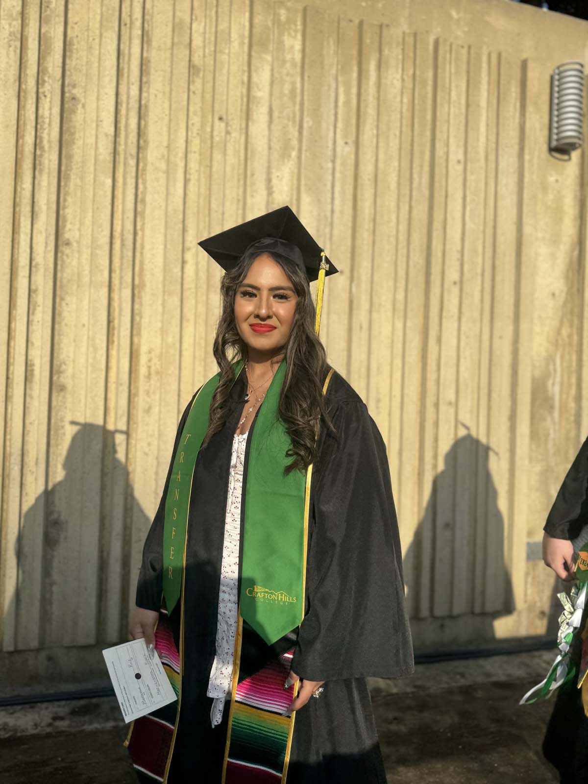Graduates walk to stage at CHC's Commencement 2024.