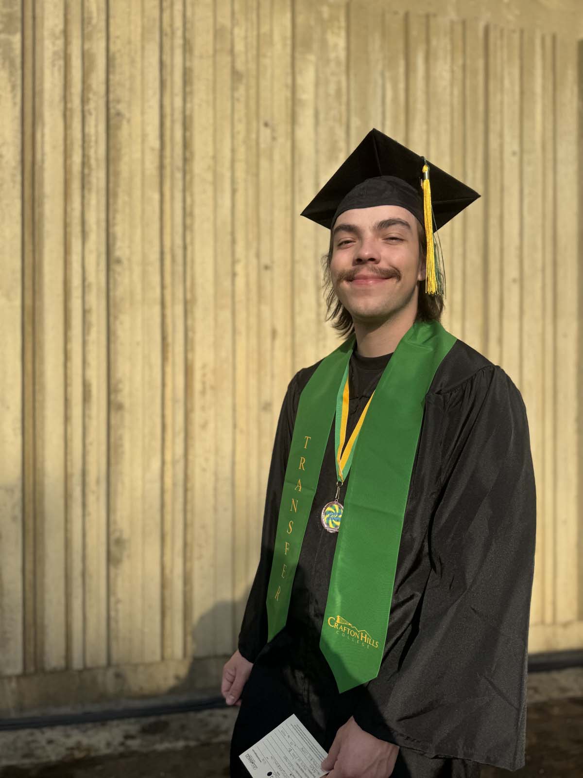 Graduates walk to stage at CHC's Commencement 2024.