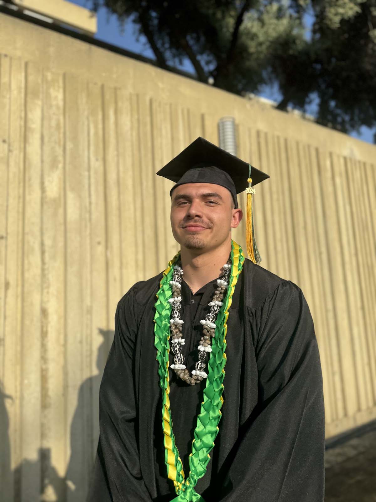 Graduates walk to stage at CHC's Commencement 2024.