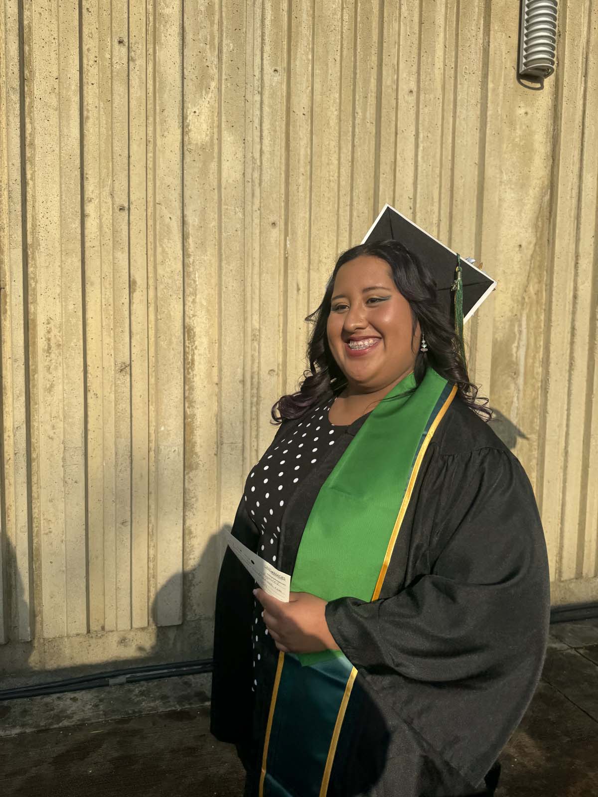 Graduates walk to stage at CHC's Commencement 2024.