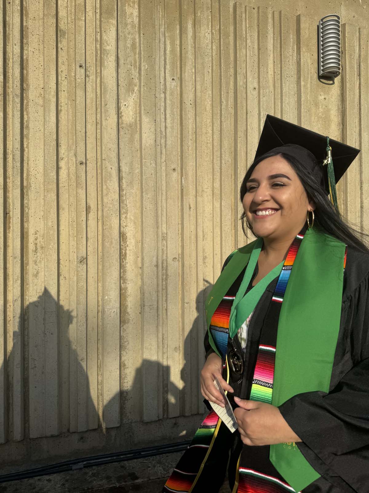 Graduates walk to stage at CHC's Commencement 2024.