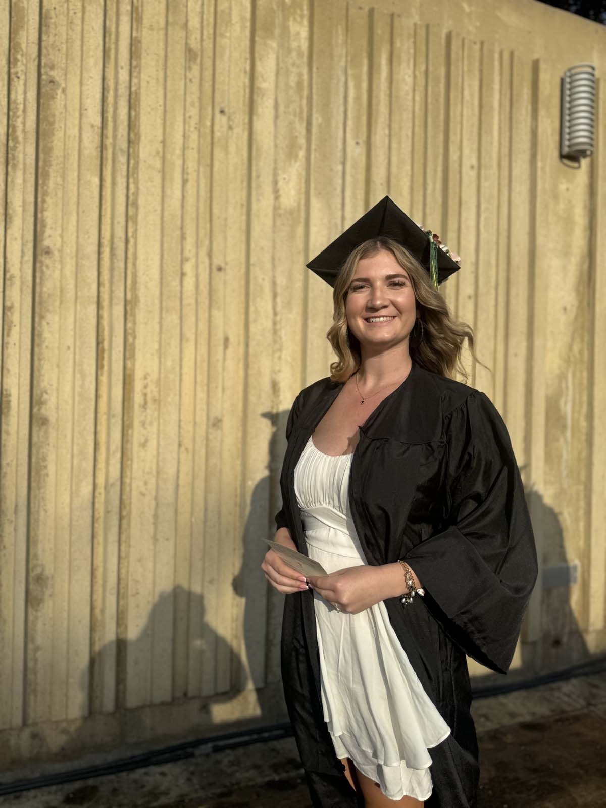 Graduates walk to stage at CHC's Commencement 2024.