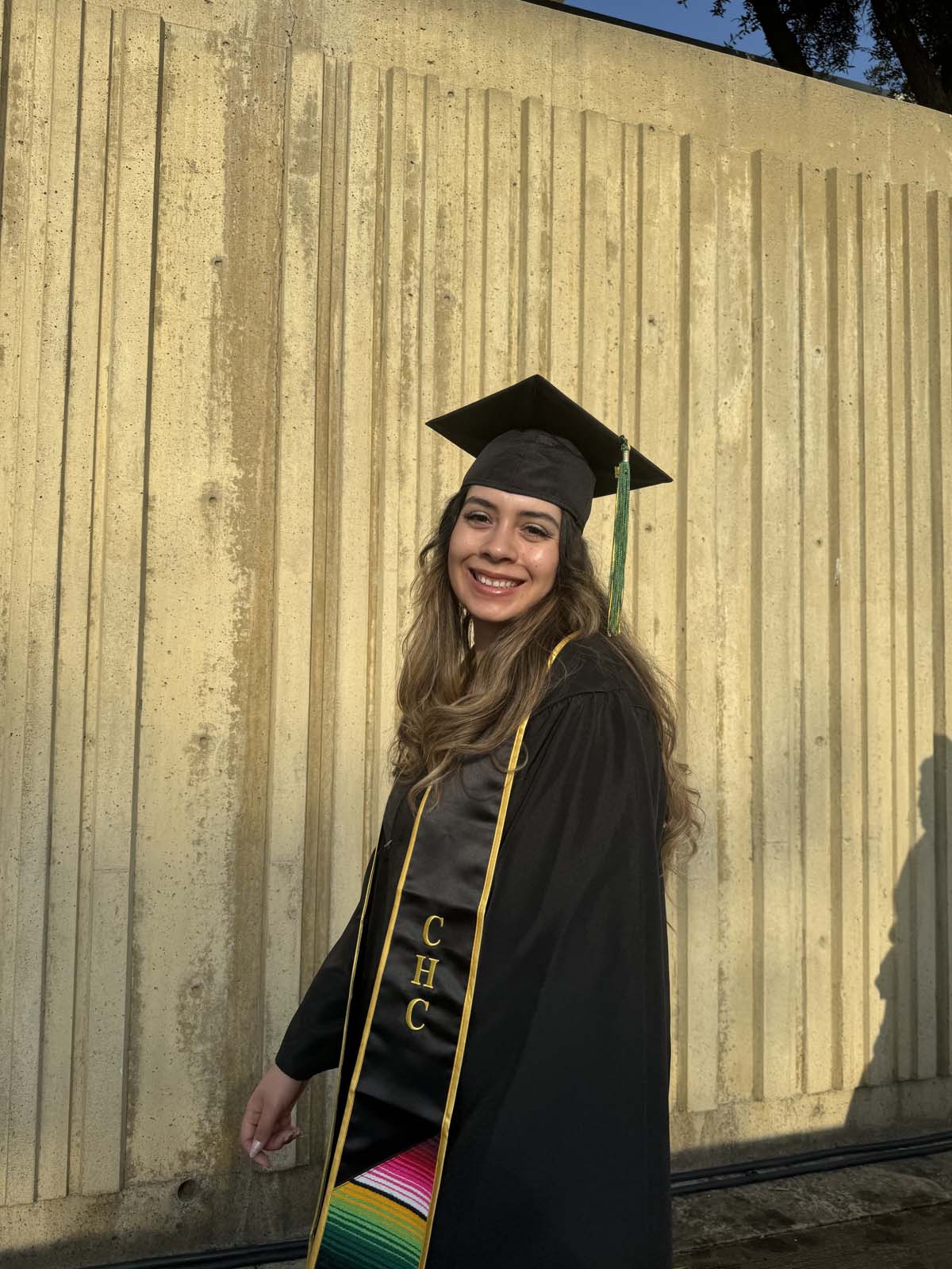 Graduates walk to stage at CHC's Commencement 2024.