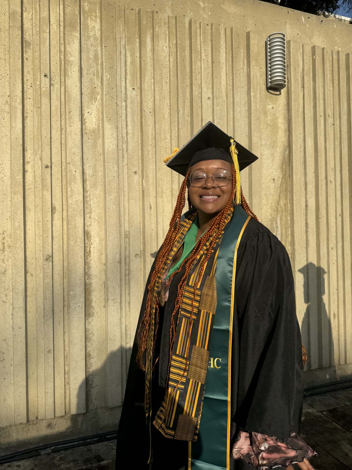 Graduates walk to stage at CHC's Commencement 2024.