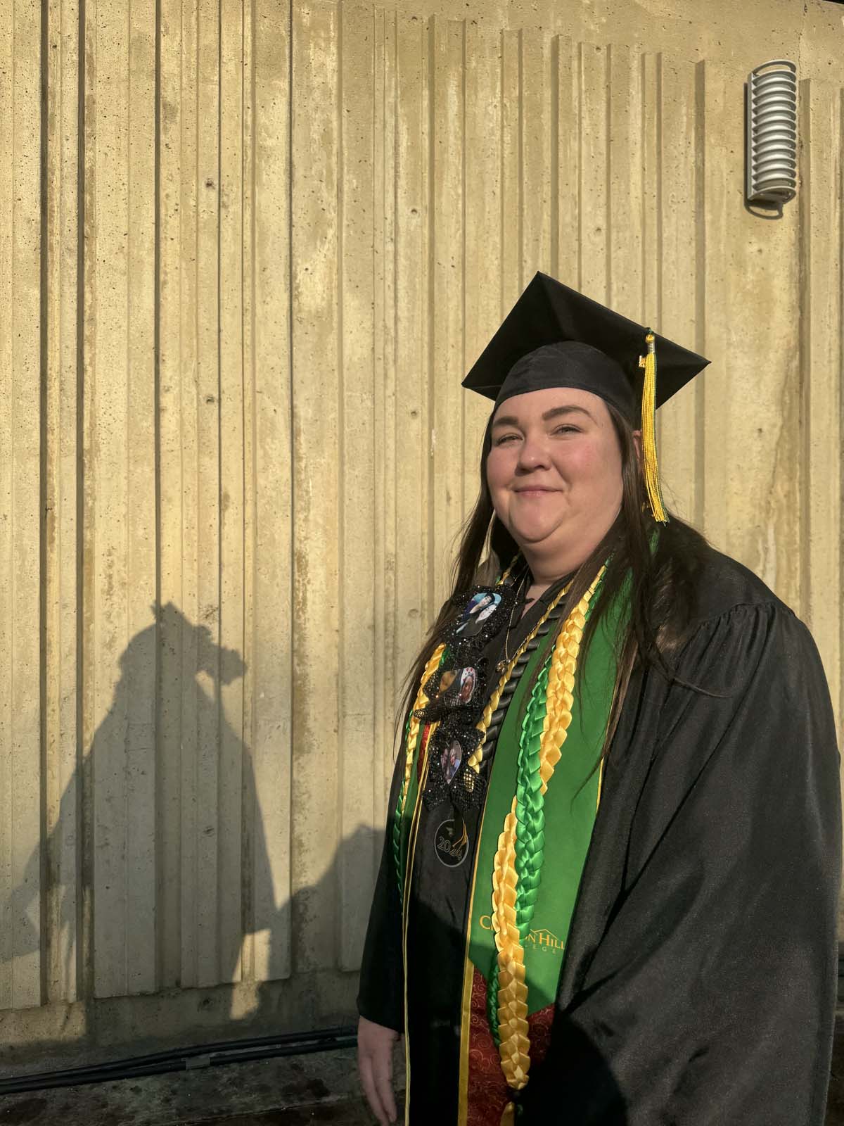 Graduates walk to stage at CHC's Commencement 2024.