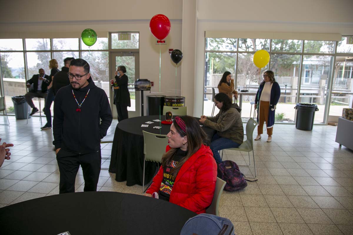 People enjoying the Black History Month closing ceremony