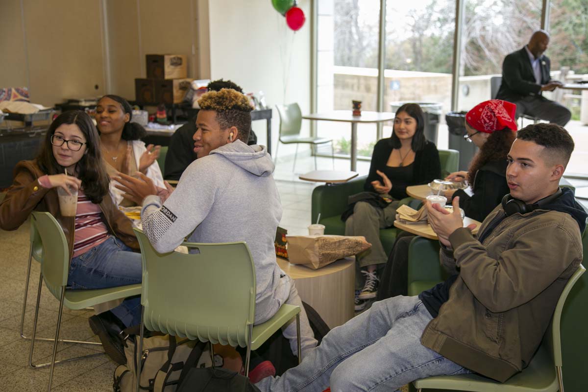 People enjoying the Black History Month closing ceremony