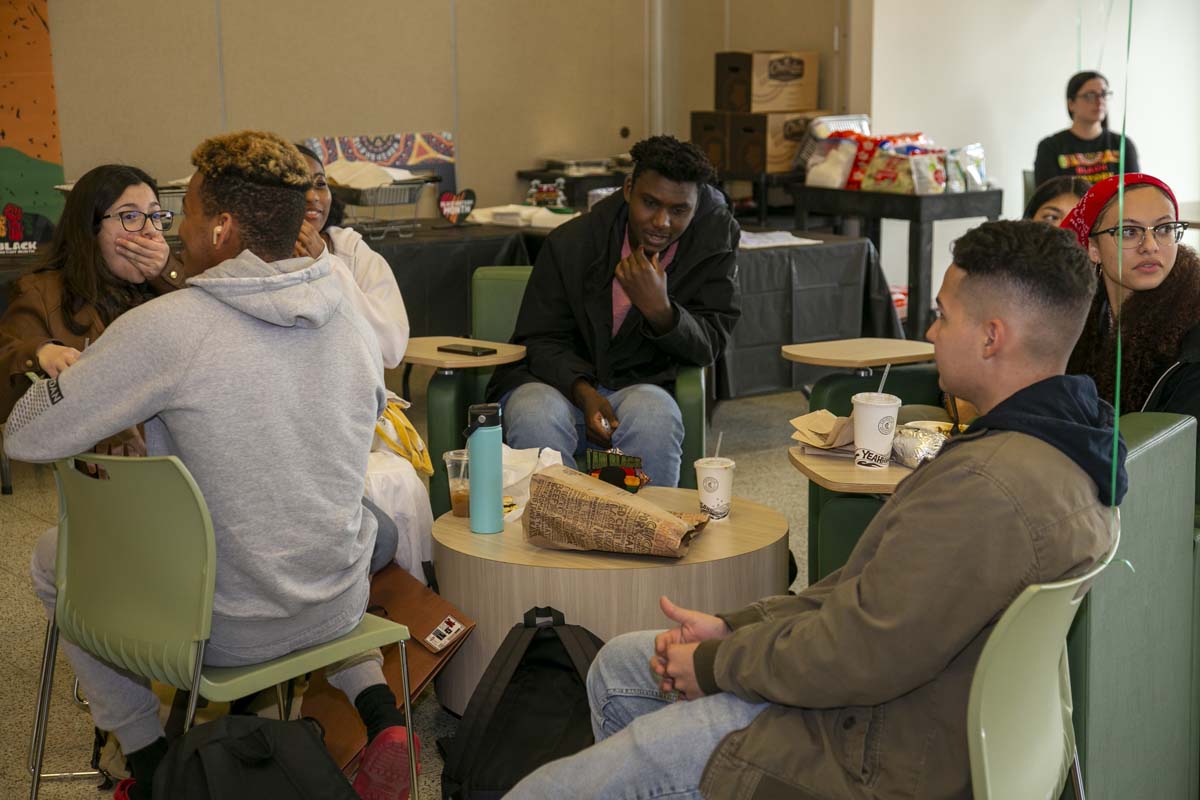 People enjoying the Black History Month closing ceremony