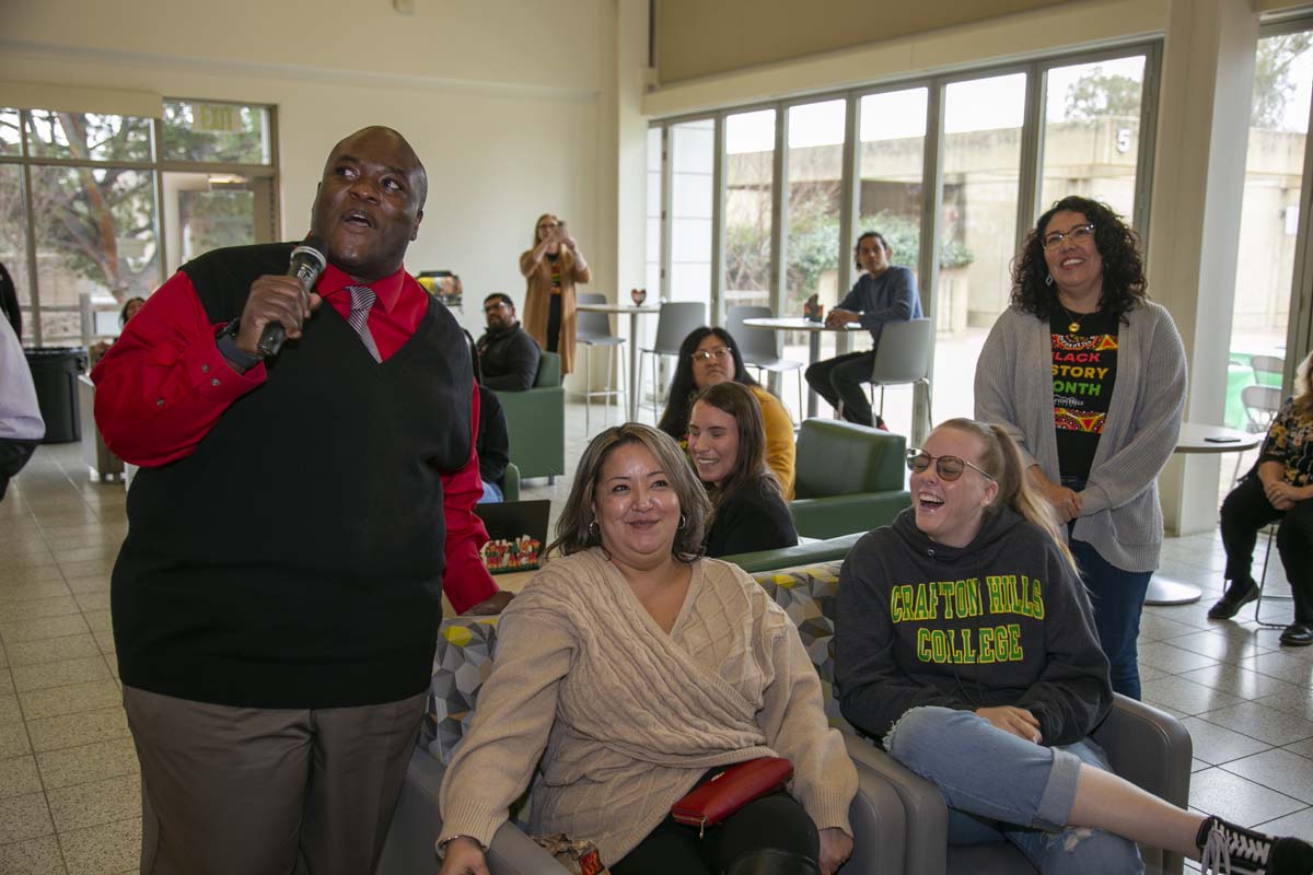 People enjoying the Black History Month closing ceremony