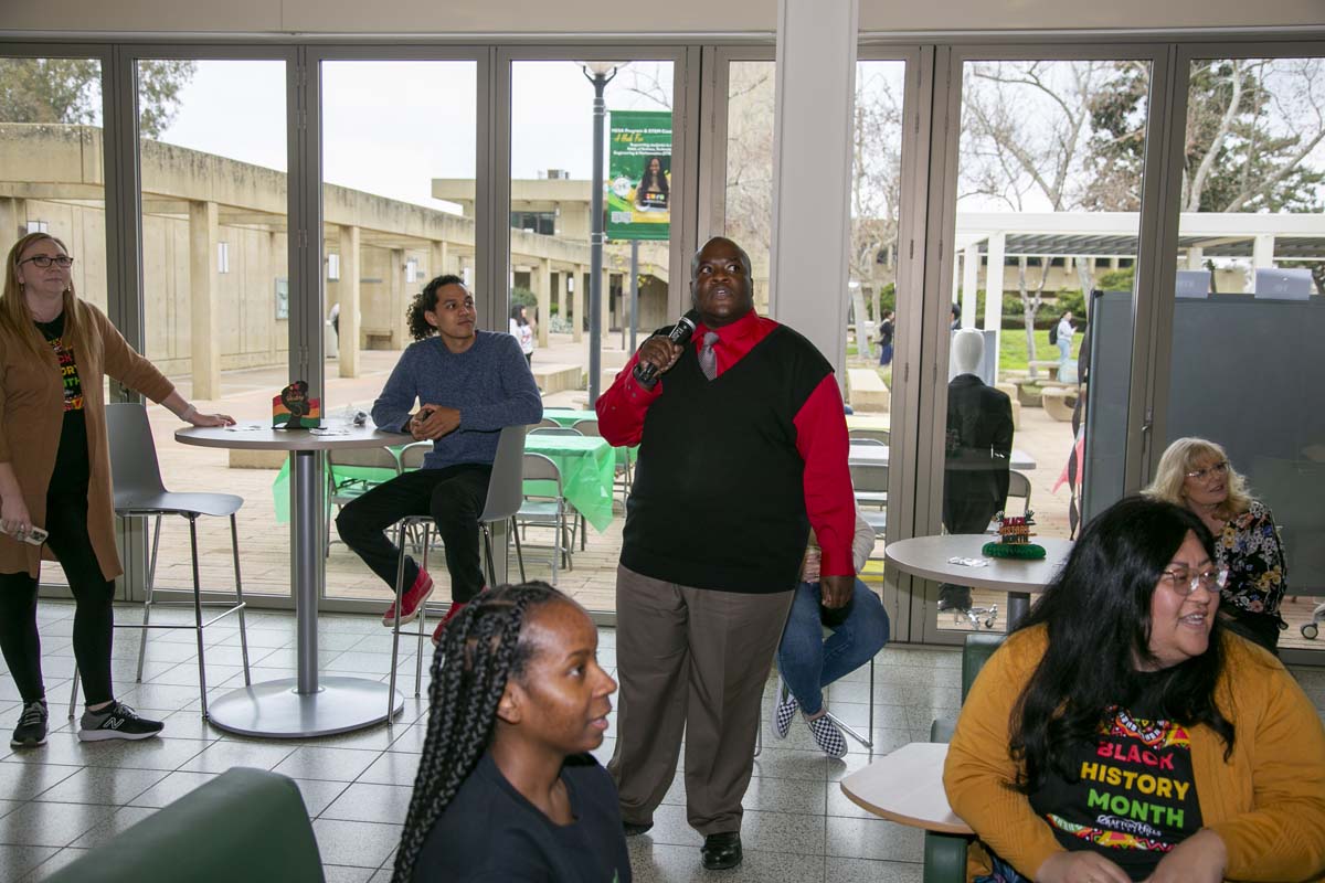 People enjoying the Black History Month closing ceremony