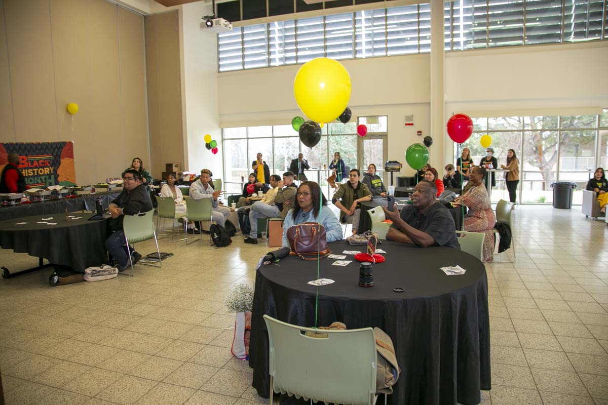 People enjoying the Black History Month closing ceremony