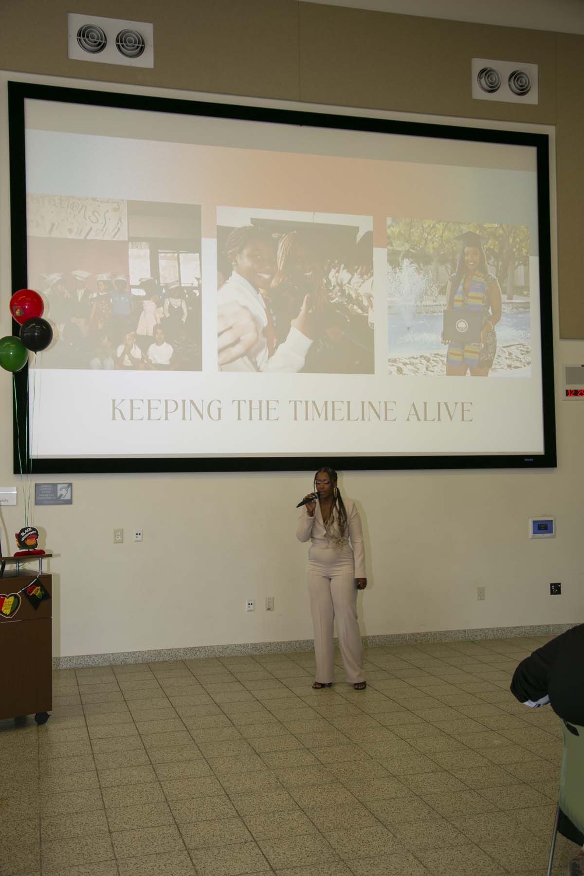 People enjoying the Black History Month closing ceremony