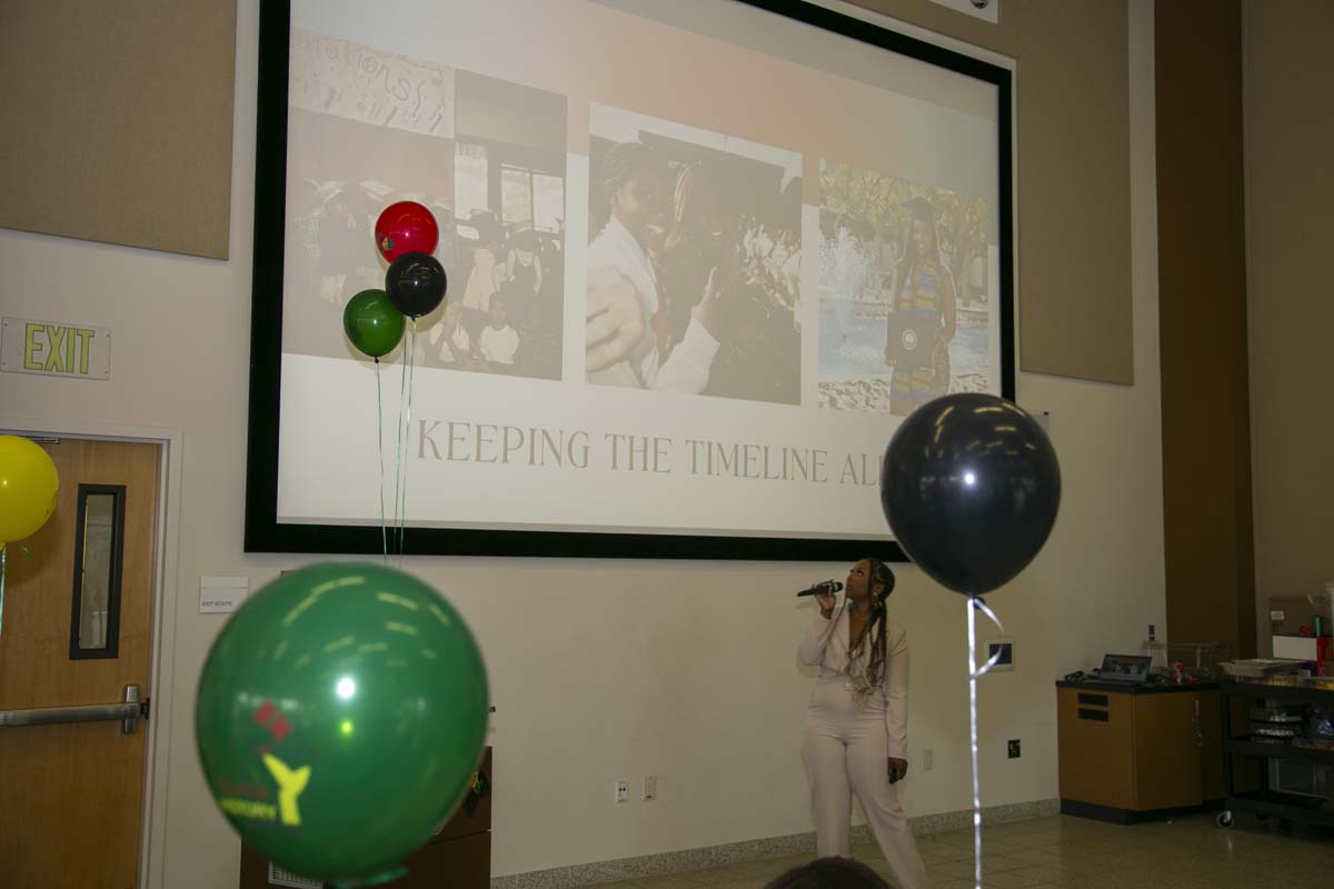 People enjoying the Black History Month closing ceremony