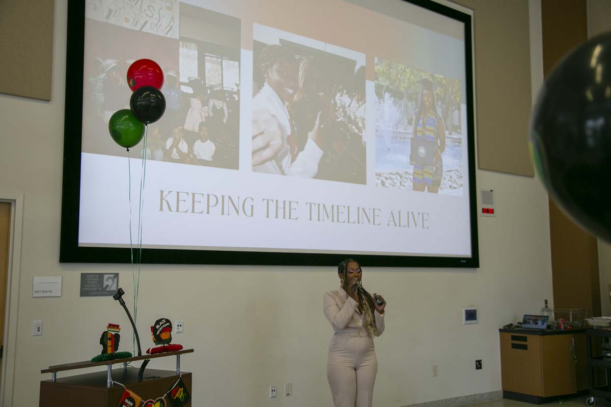 People enjoying the Black History Month closing ceremony