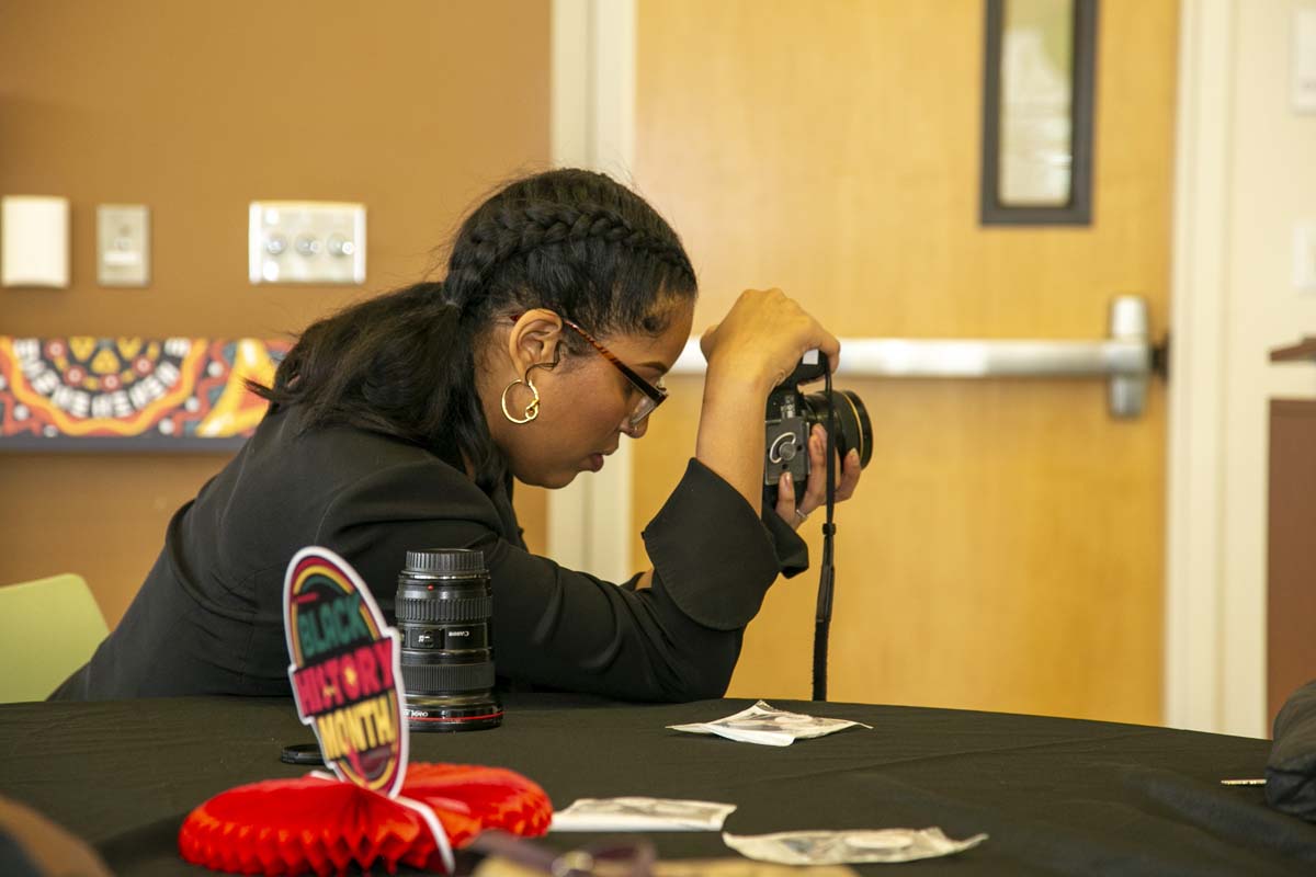 People enjoying the Black History Month closing ceremony