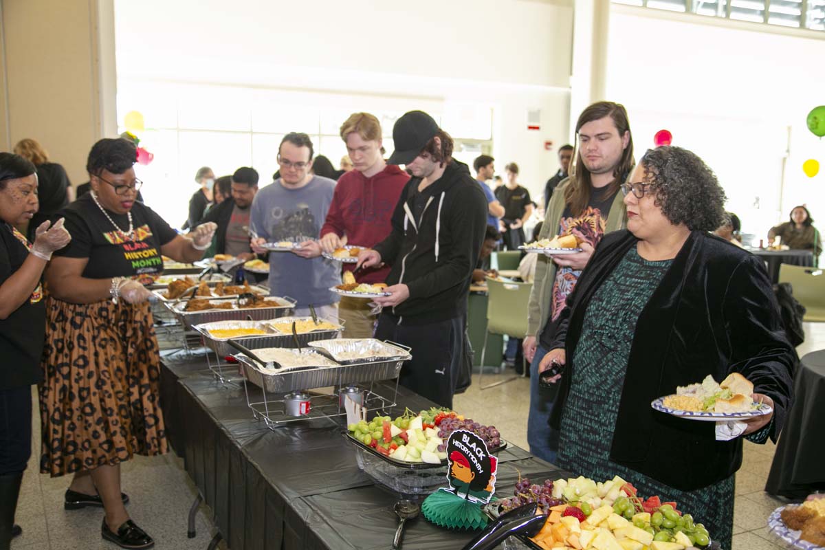 People enjoying the Black History Month closing ceremony