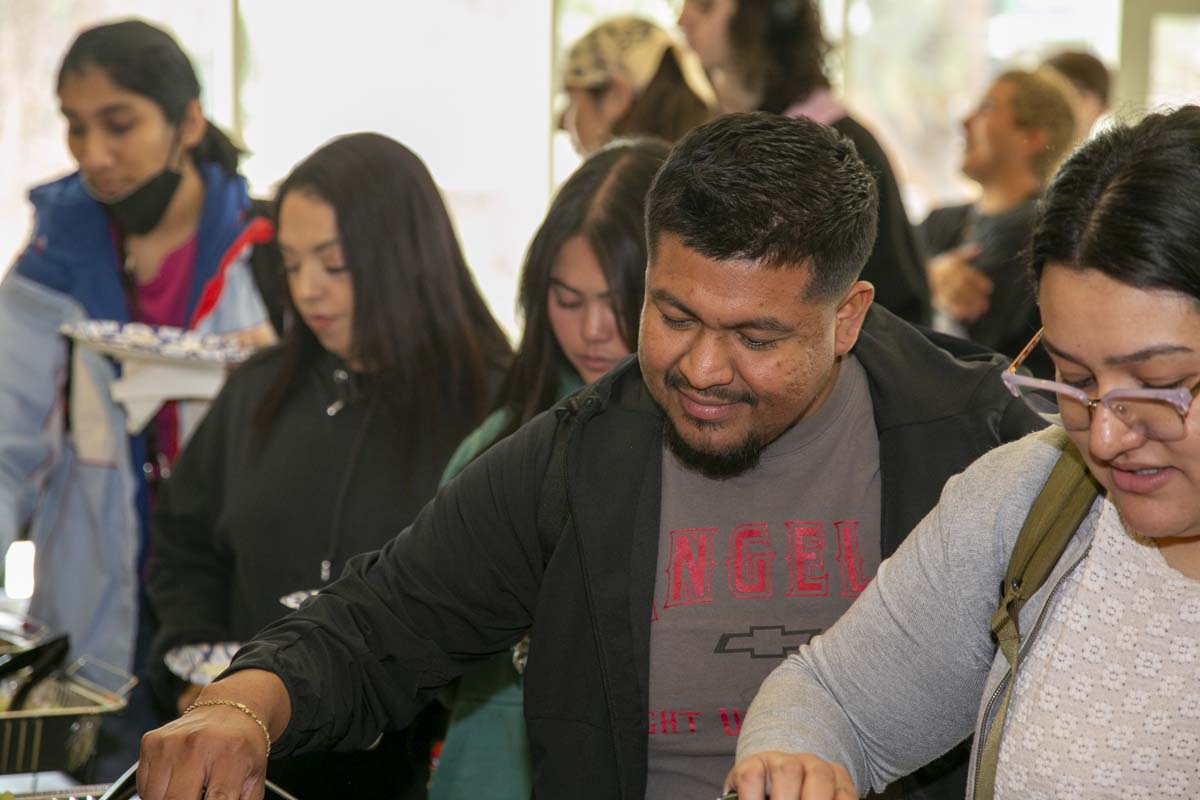 People enjoying the Black History Month closing ceremony