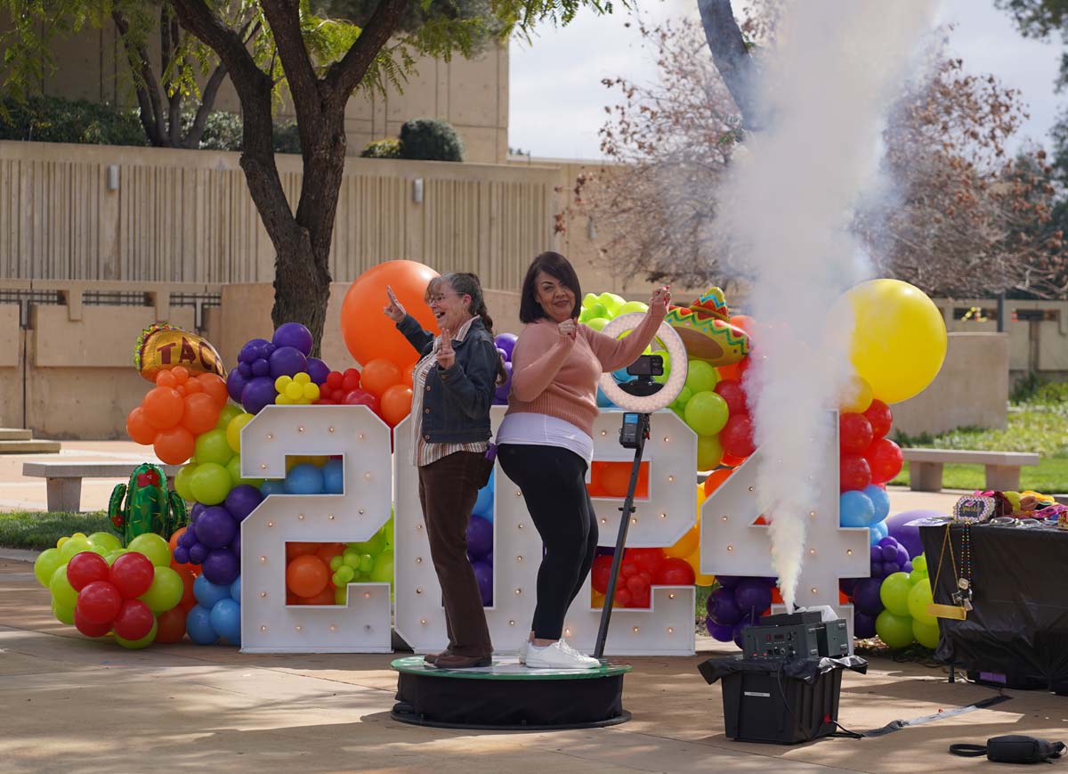 People enjoying the Grad Fair