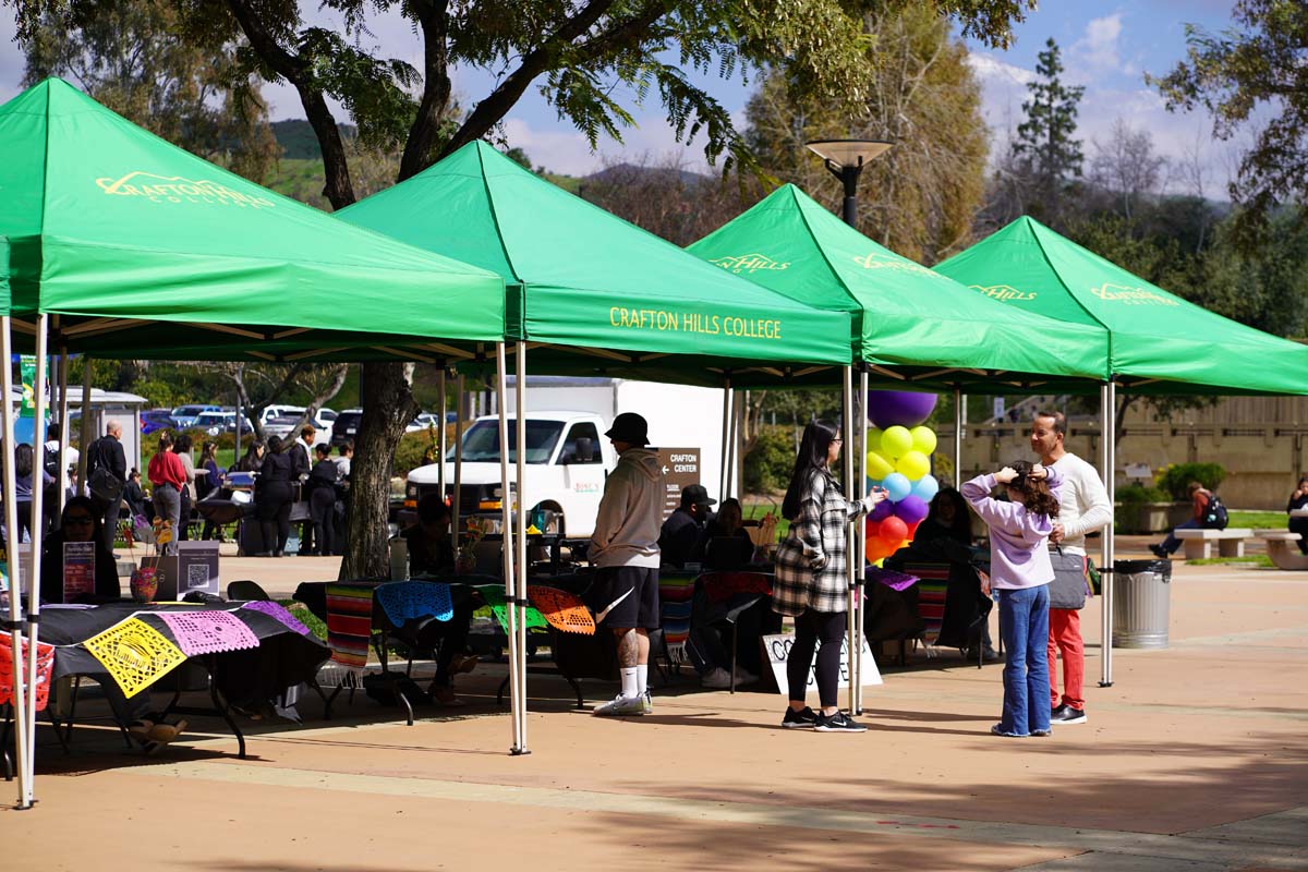 People enjoying the Grad Fair