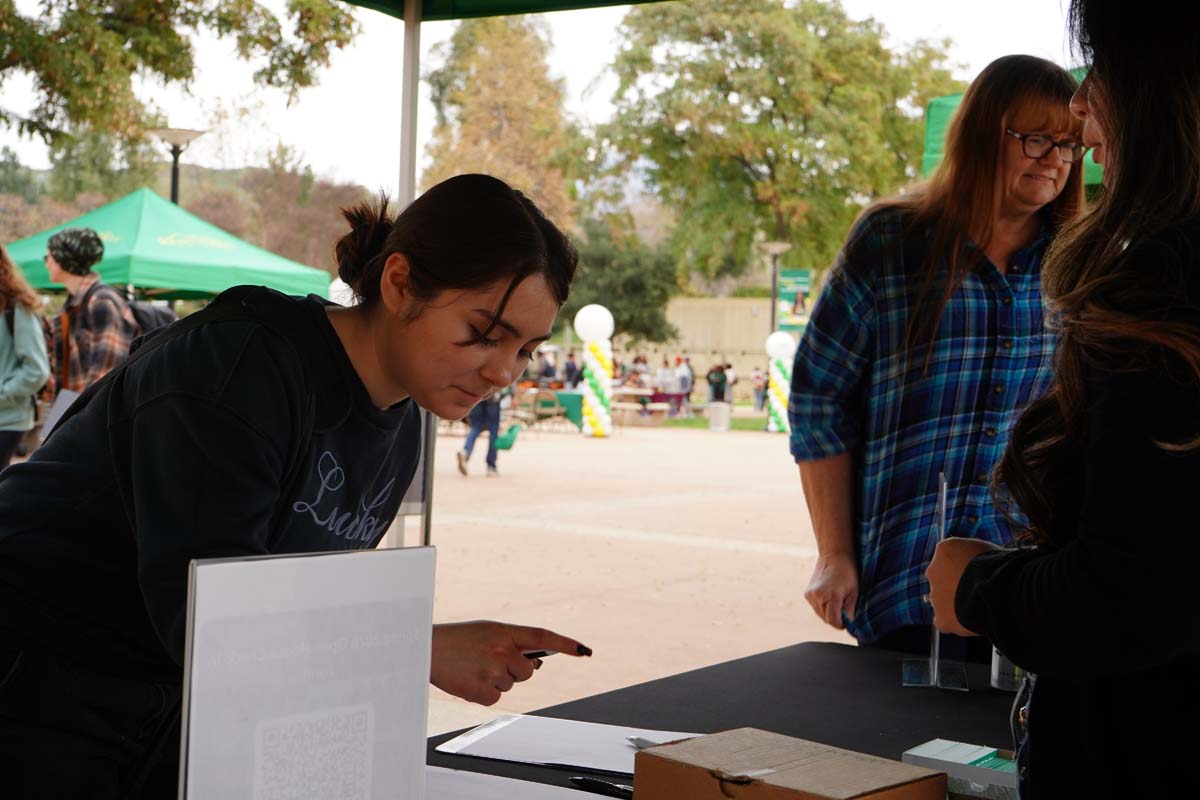Student at a booth