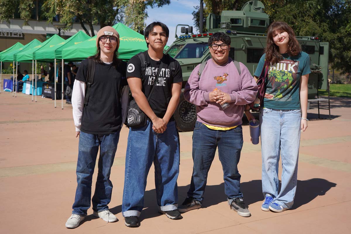 Four students at the STEM Career and Transfer Fair