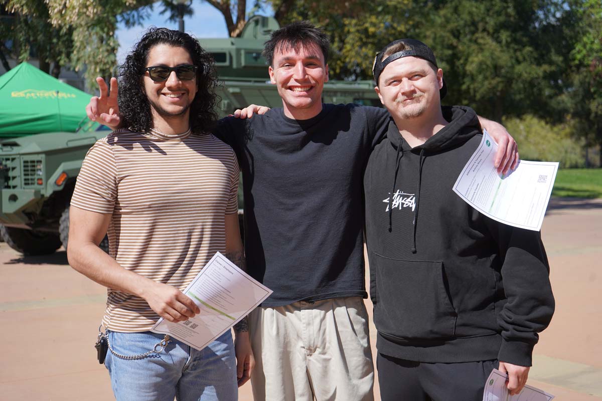 Three students at the STEM Career and Transfer Fair