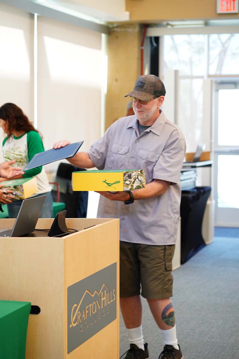 EOPS Scholar receiving certificate