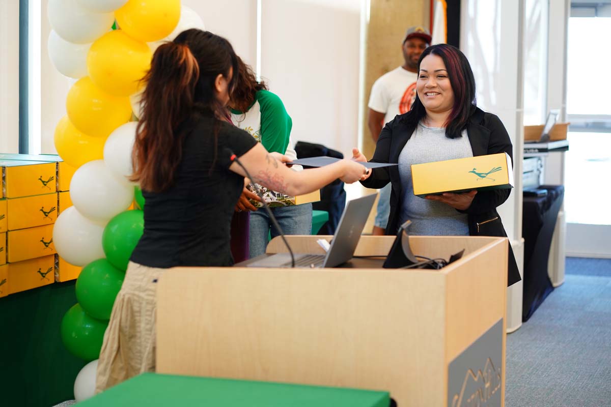 EOPS Scholar receiving certificate