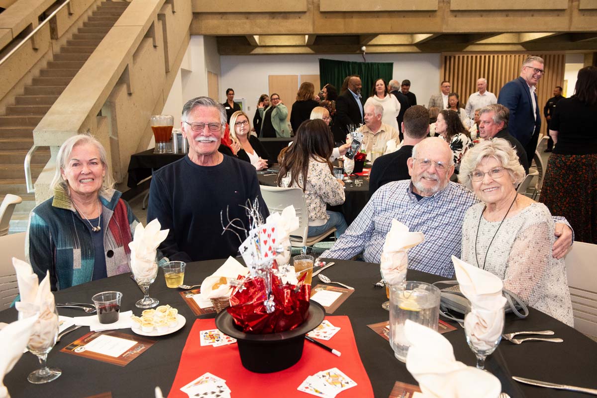 President's Circle Magic Night people at table