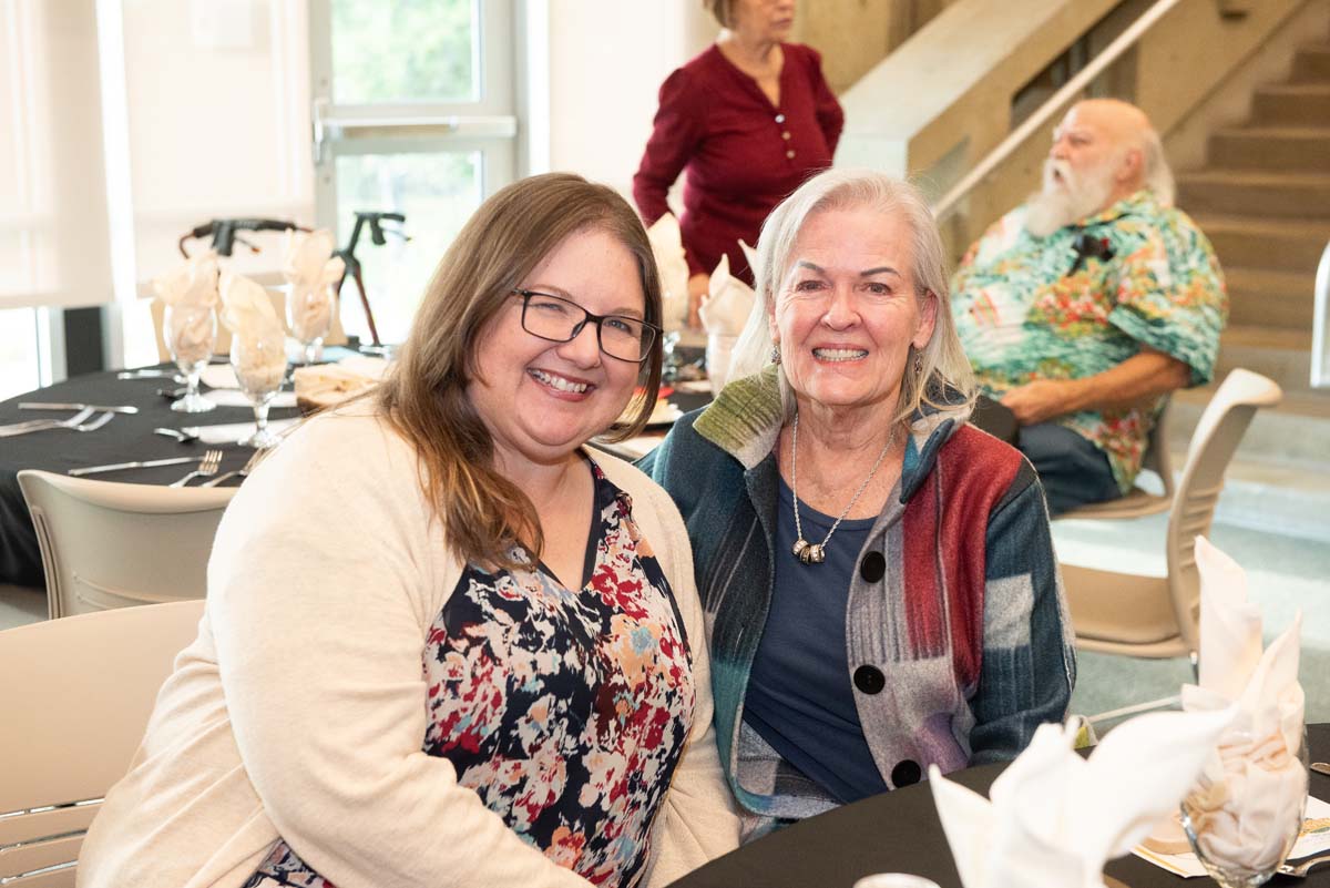 President's Circle Magic Night people at table