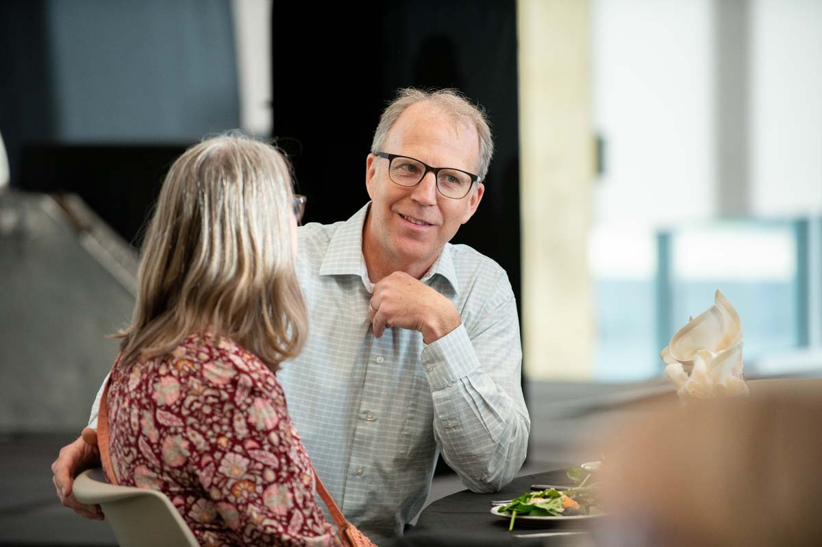President's Circle Magic Night people at table