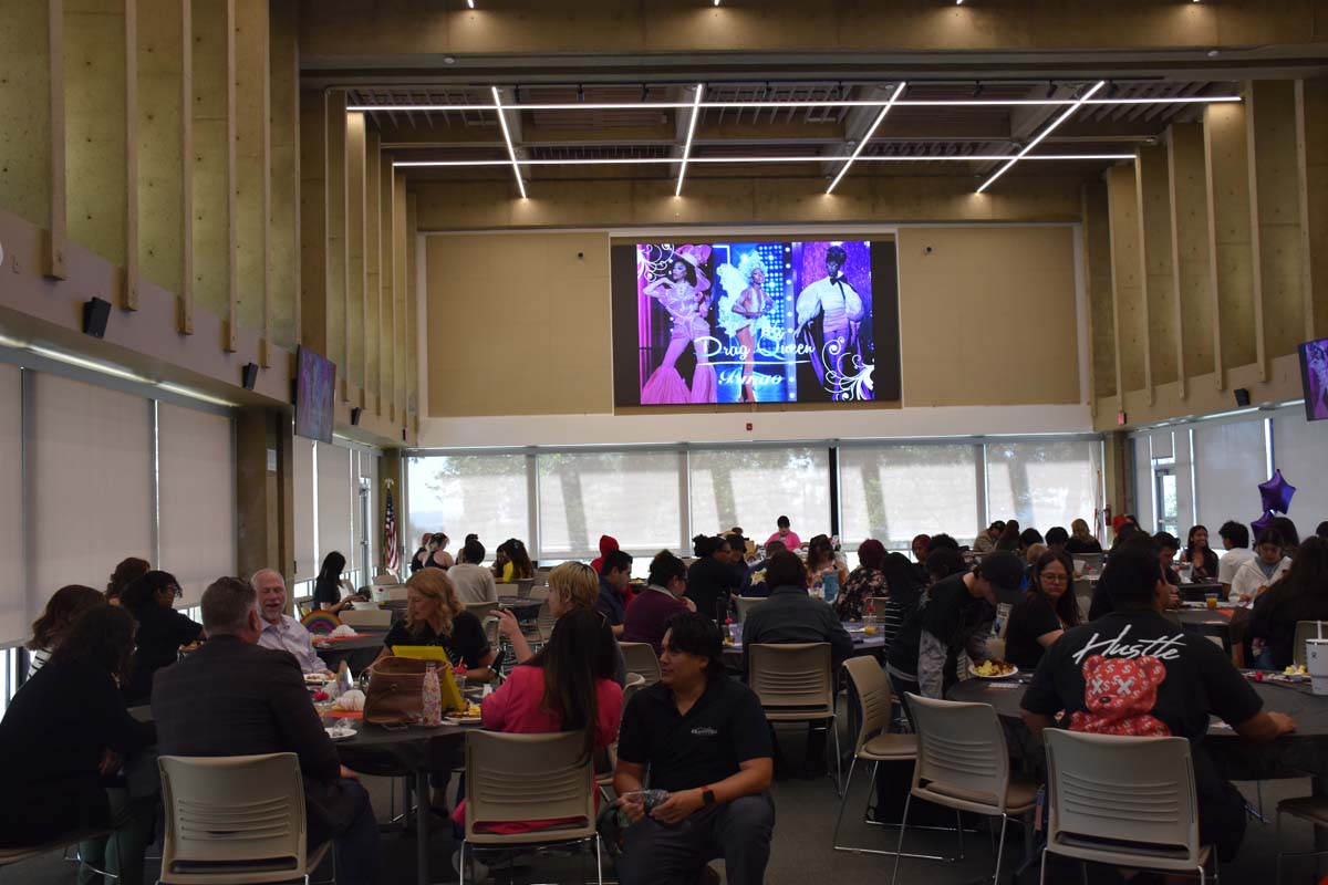 View of all of the table at drag queen bingo