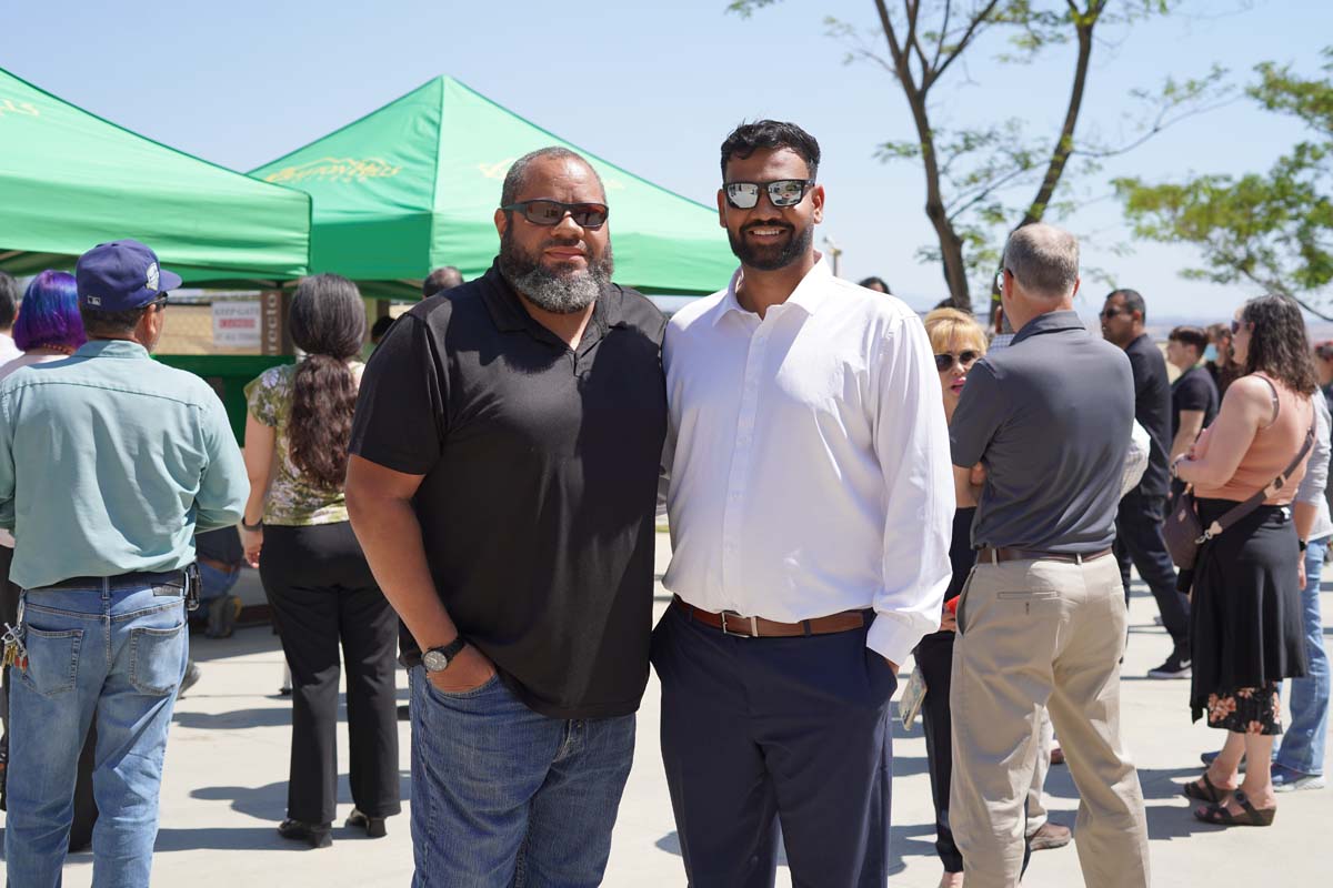 Two people posing at the event