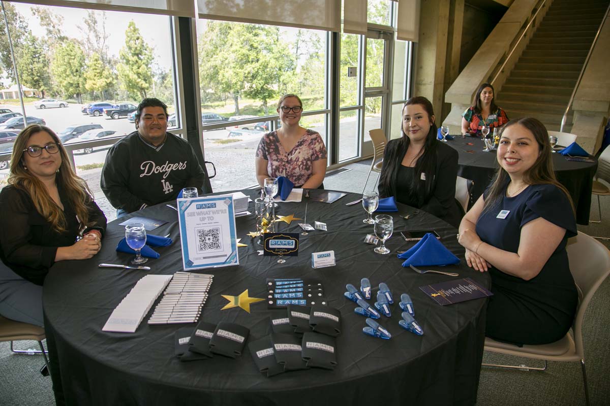 Etiquette Luncheon table with 5 students