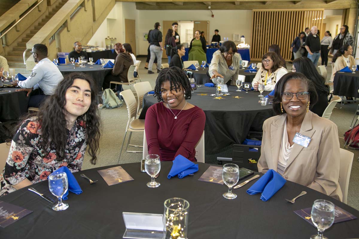 Etiquette Luncheon table with 3 students