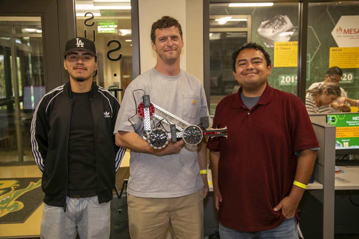Three Student participants at robotic competition