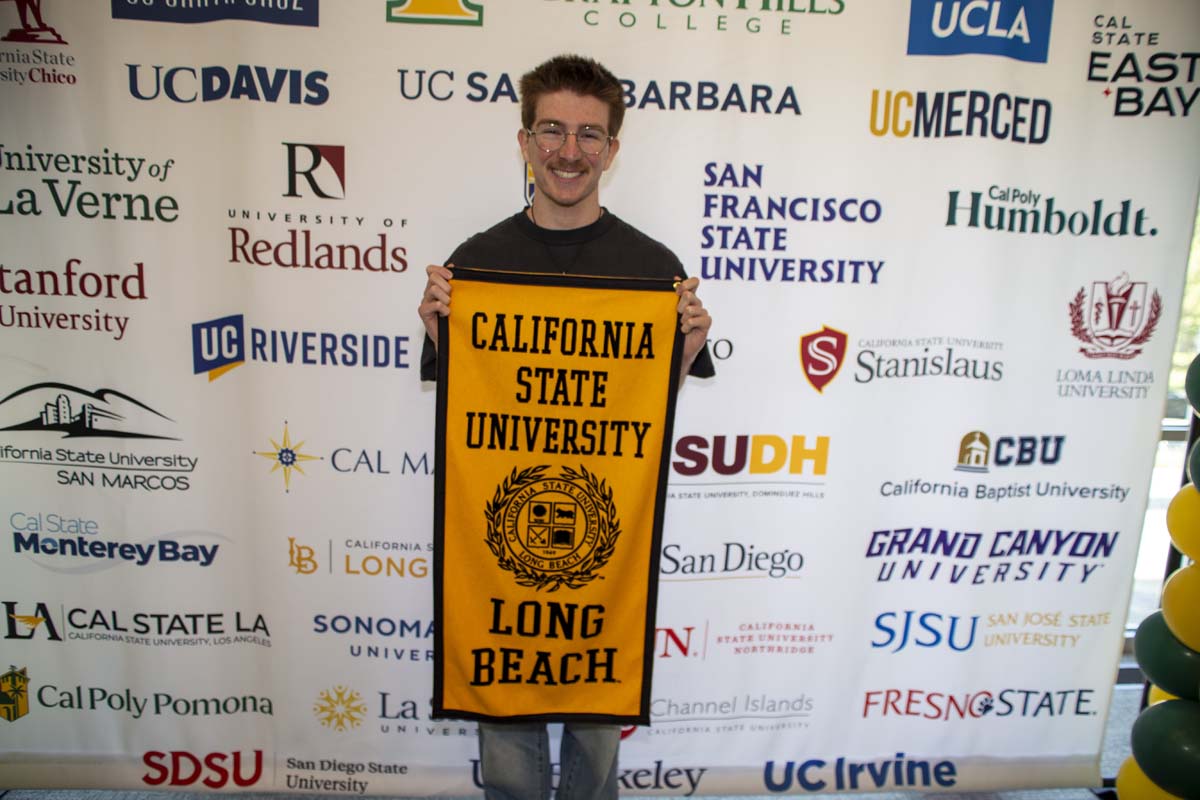 Student with CSU Long Beach transfer flag