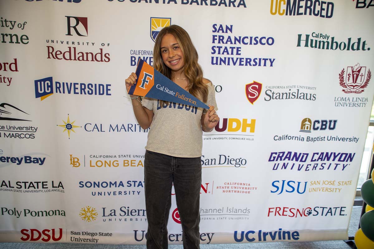 Student with Cal State Fullerton transfer flag