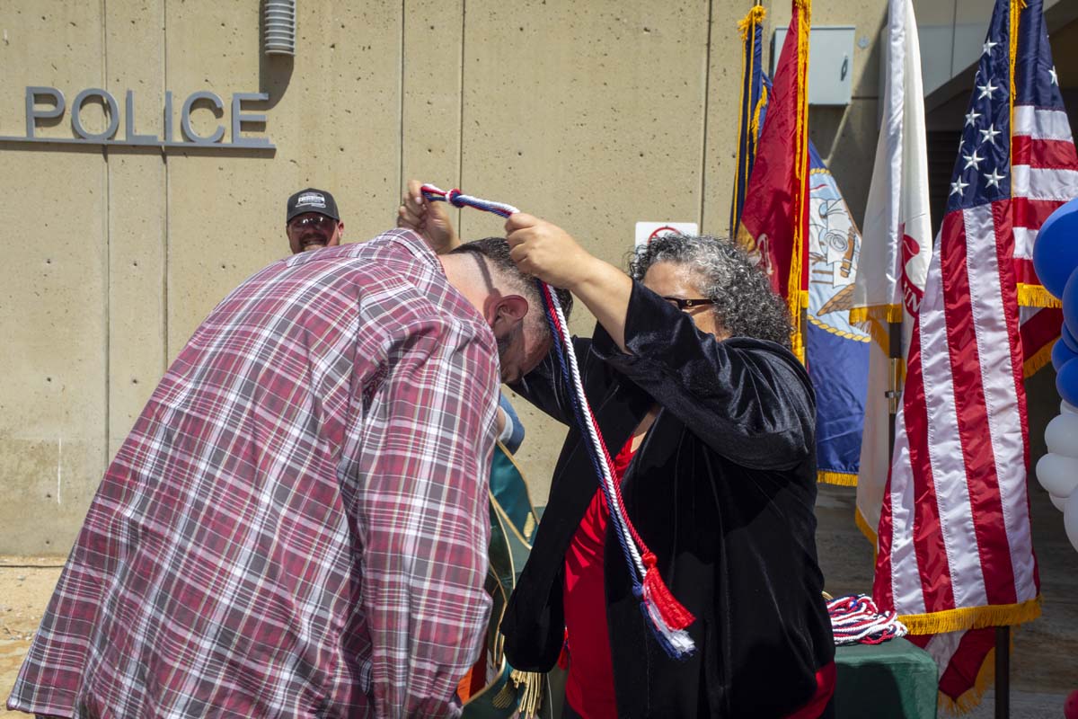 Student receiving cords