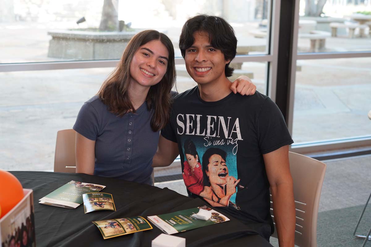 Two MESA students at a table