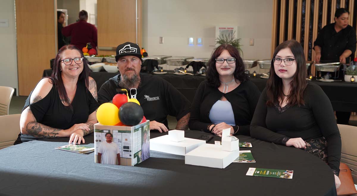 Four people at a table