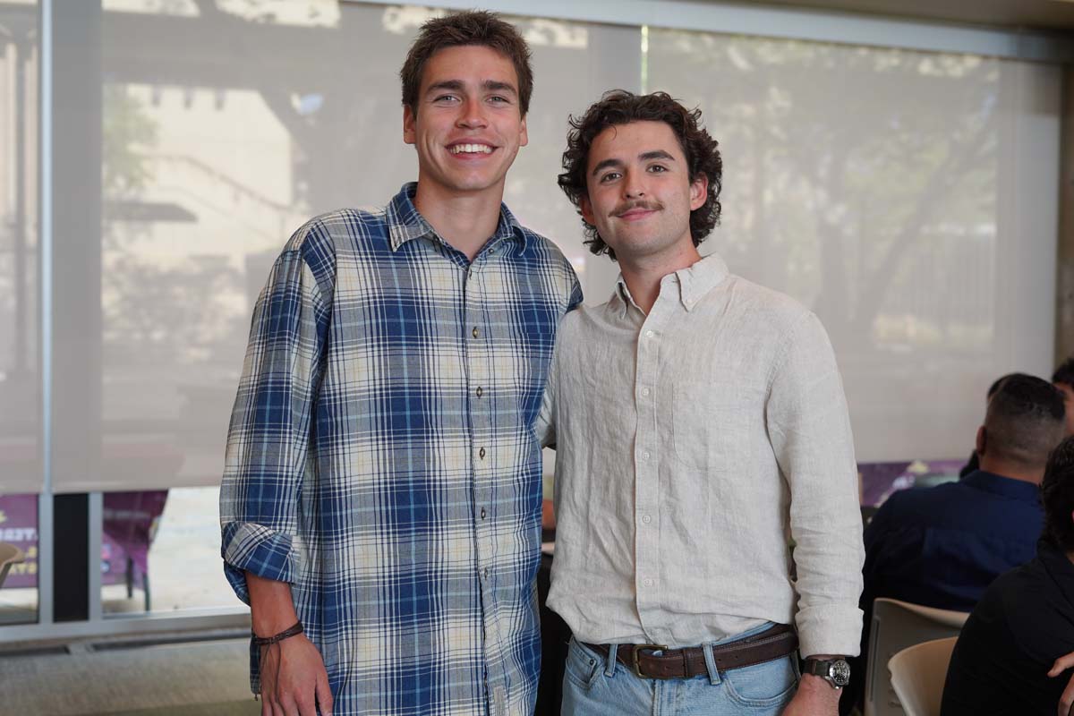 Two student athletes posing for a photo