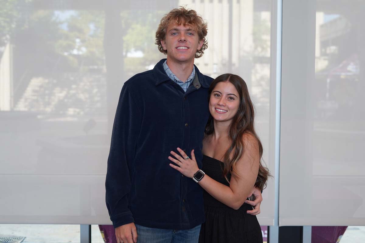 Two student athletes posing for a photo