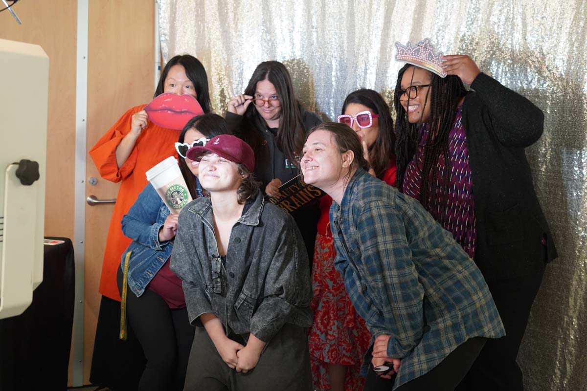 Group posing in photo booth