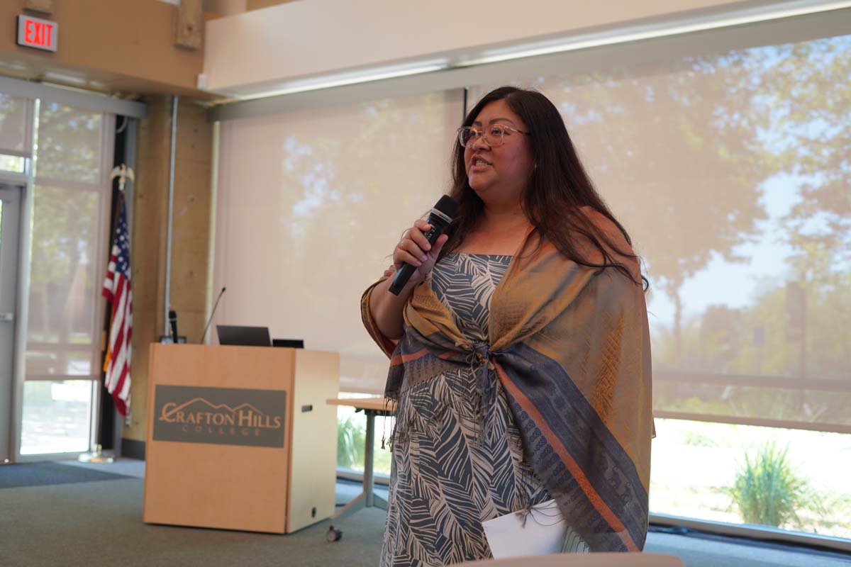 Event organizer welcoming guests