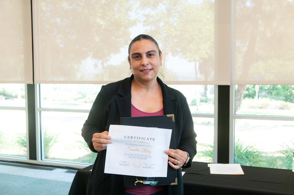 Sandra with certificate