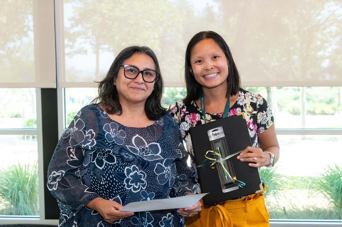 Ana posing after tenure annoucement