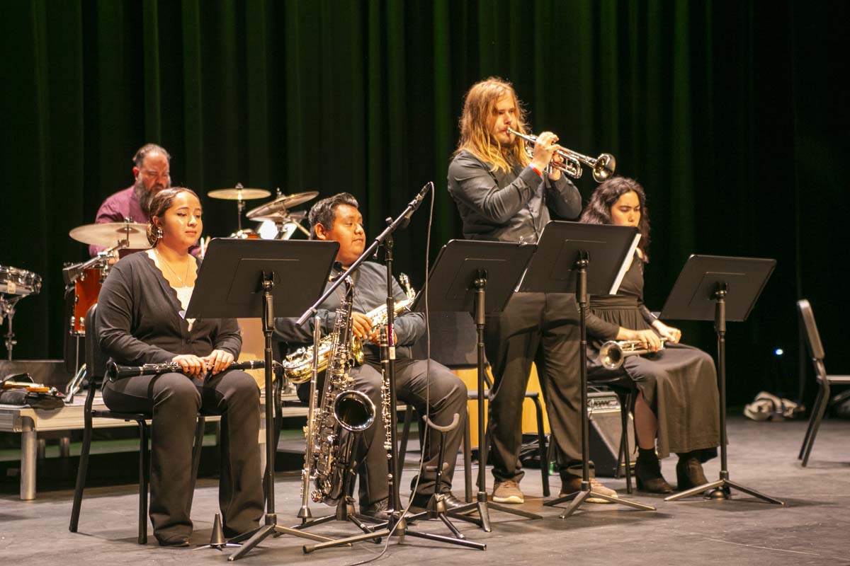 Group of students playing brass instruments at jazz concert